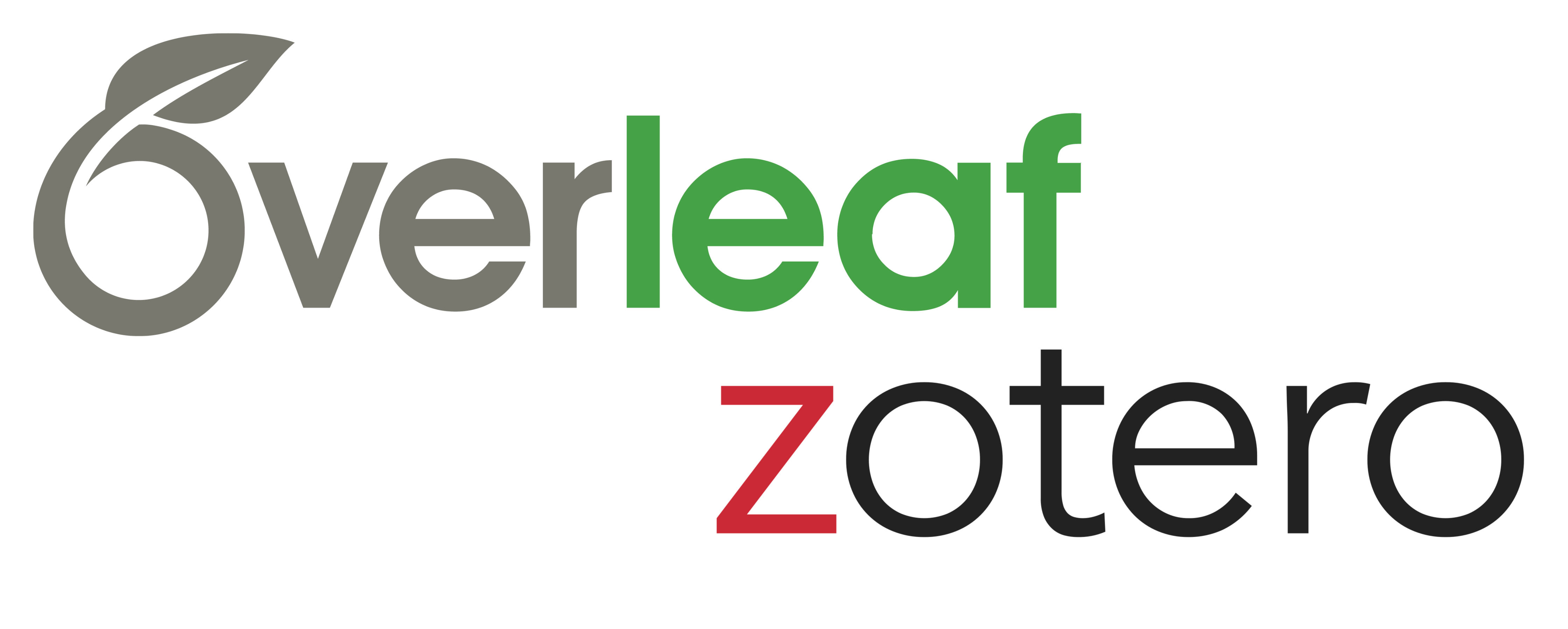 A young man sits in front of a computer keyboard, surrounded by monitors and books and with computer cables covering various surfaces.